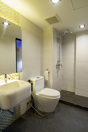 Imagen de la habitación del Hotel Eleven Avenue Suites. Foto 3