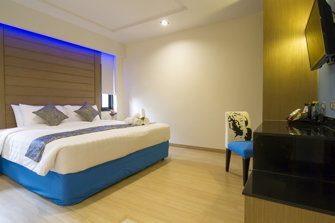 Imagen de la habitación del Hotel Eleven Avenue Suites. Foto 7