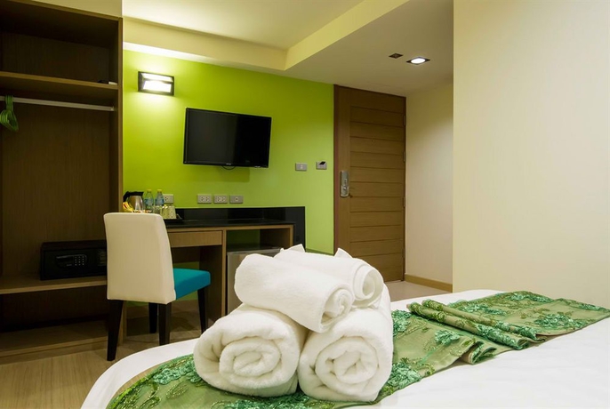 Imagen de la habitación del Hotel Eleven Avenue Suites. Foto 10