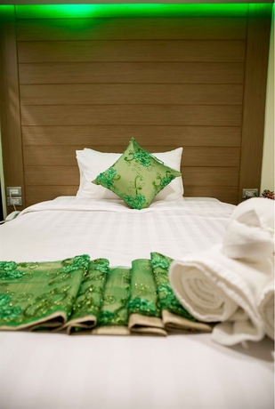 Imagen de la habitación del Hotel Eleven Avenue Suites. Foto 11