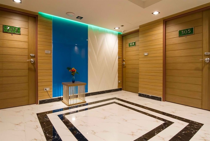 Imagen de los interiores del Hotel Eleven Avenue Suites. Foto 14