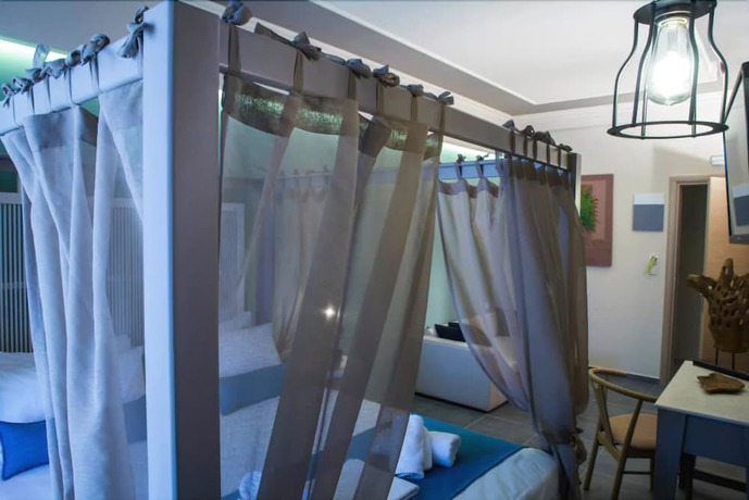 Imagen de la habitación del Hotel Elia Potie. Foto 17