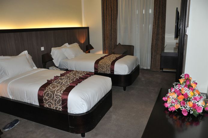 Imagen de la habitación del Hotel Elilly International. Foto 2