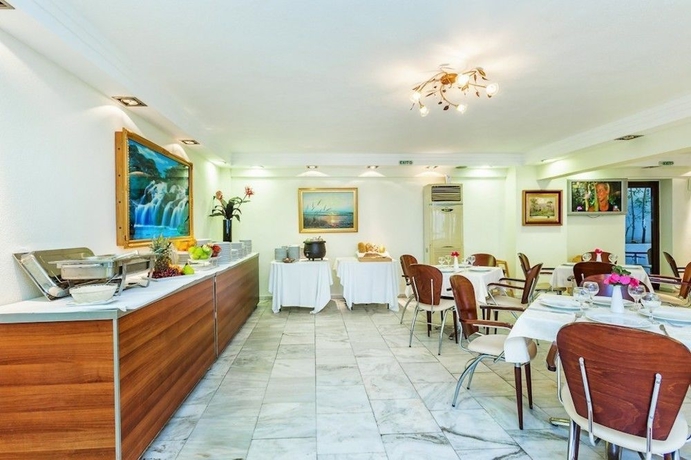 Imagen del bar/restaurante del Hotel Elinotel Polis. Foto 5