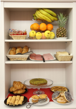 Imagen del bar/restaurante del Hotel Elios Rooms. Foto 3