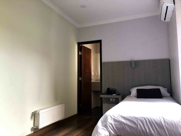 Imagen de la habitación del Hotel Elisa Cole. Foto 23