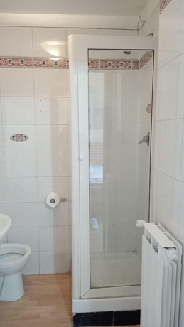 Imagen de la habitación del Hotel Eliseo Napoli. Foto 17
