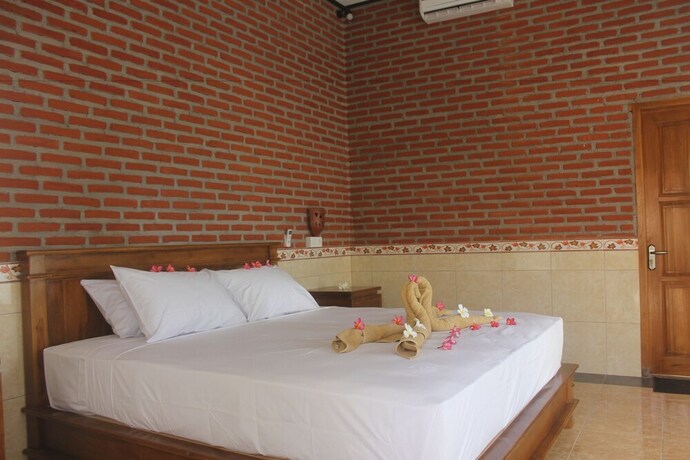 Imagen de la habitación del Hotel Eliska Sari Bungalows. Foto 19