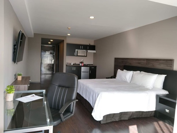 Imagen de la habitación del Hotel Elite 47 and Suites. Foto 2