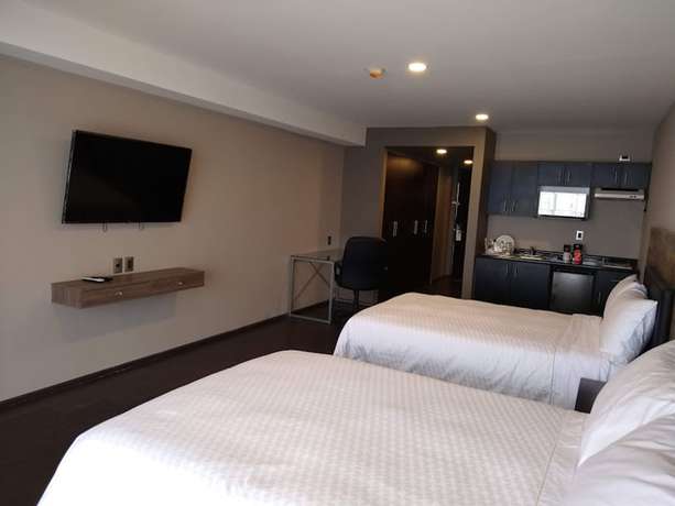 Imagen de la habitación del Hotel Elite 47 and Suites. Foto 6