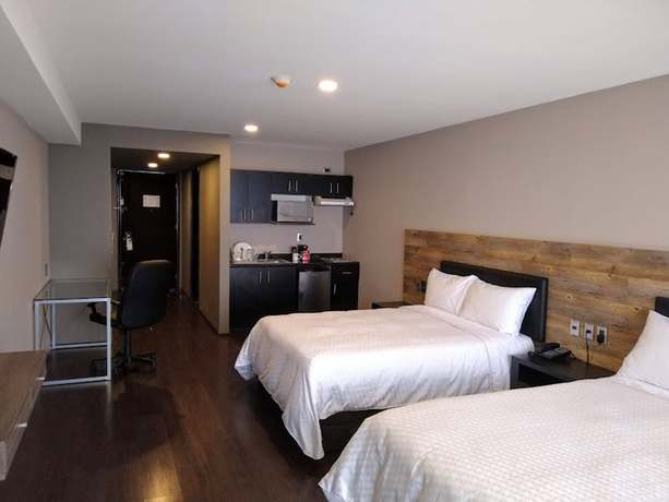 Imagen de la habitación del Hotel Elite 47 and Suites. Foto 12