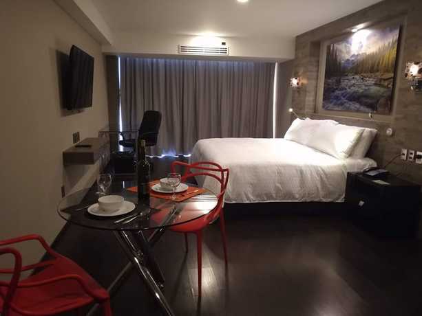 Imagen de la habitación del Hotel Elite 47 and Suites. Foto 13