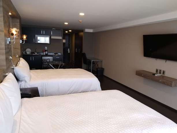Imagen de la habitación del Hotel Elite 47 and Suites. Foto 14