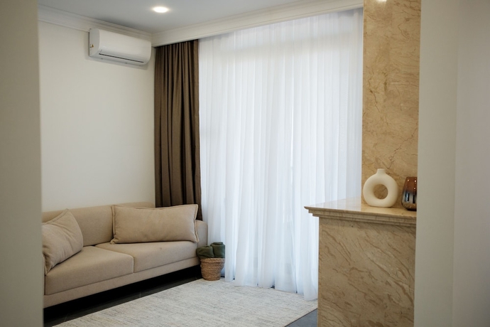 Imagen de la habitación del Hotel Elite Family Residence. Foto 12