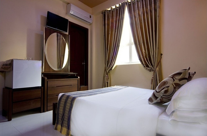 Imagen de la habitación del Hotel Elite Inn. Foto 5