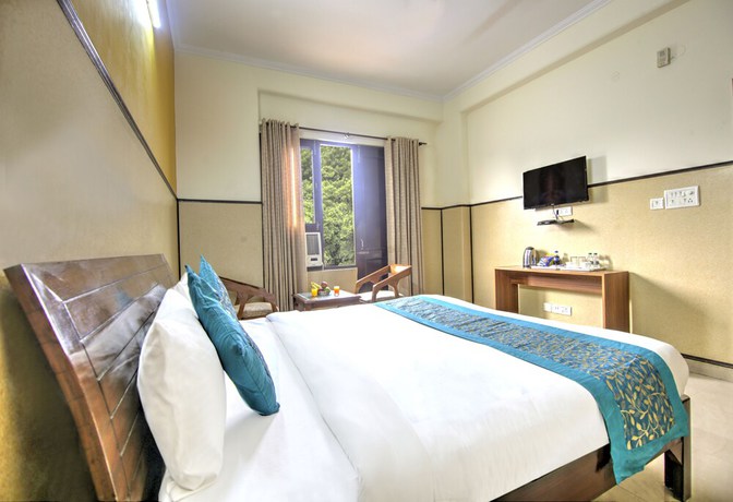 Imagen de la habitación del Hotel Elite Peak, Noida. Foto 7