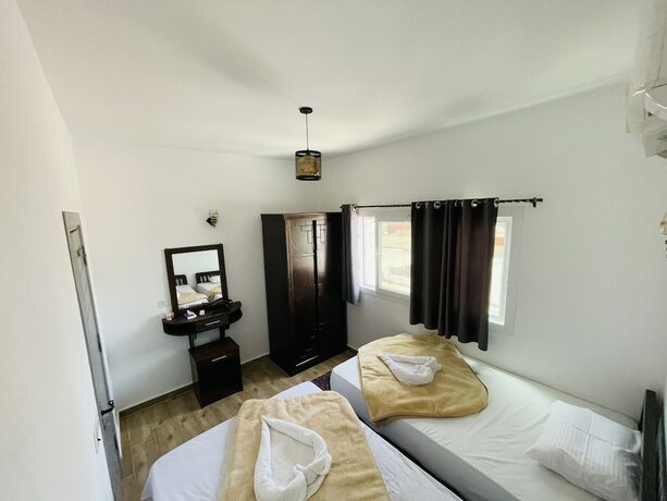Imagen de la habitación del Hotel Elite Residence. Foto 19