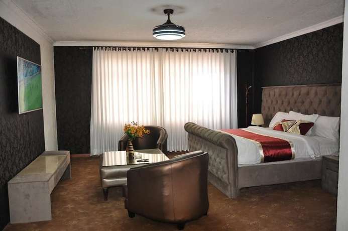Imagen de la habitación del Hotel Elite Suites. Foto 16