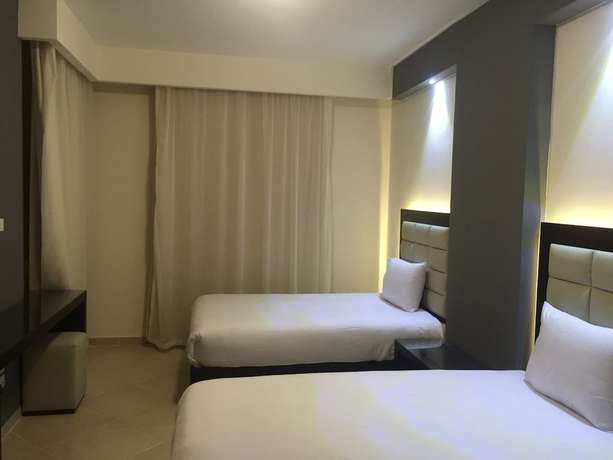 Imagen de la habitación del Hotel Elite Suites Hurghada. Foto 9