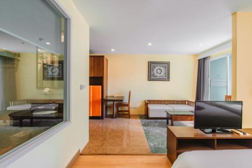 Imagen de la habitación del Hotel Elite Suites Patong by Bauman Residence. Foto 12