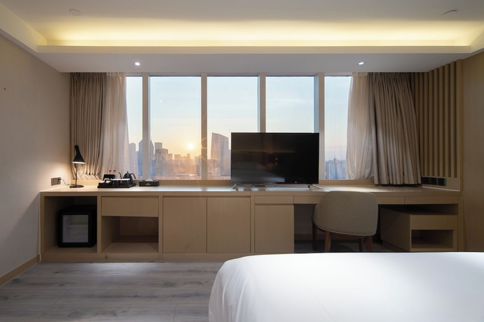 Imagen de la habitación del Hotel Elites, tianhe. Foto 4