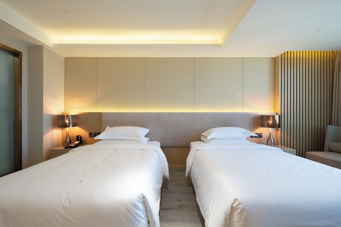 Imagen de la habitación del Hotel Elites, tianhe. Foto 16