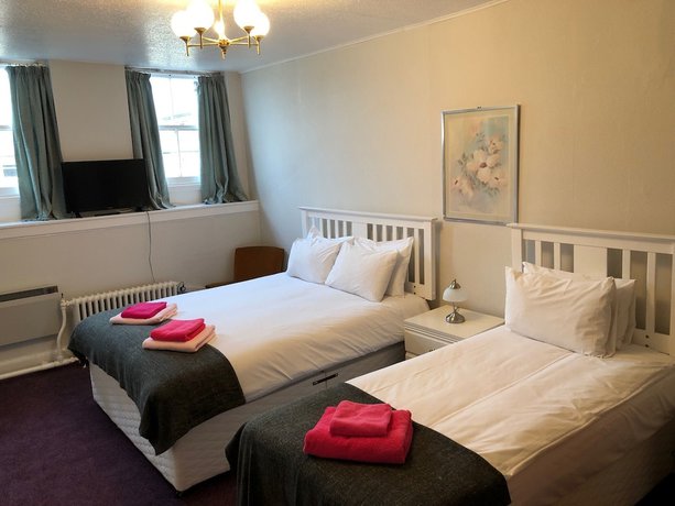 Imagen de la habitación del Hotel Eliza House. Foto 7