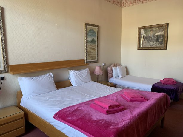 Imagen de la habitación del Hotel Eliza House. Foto 9