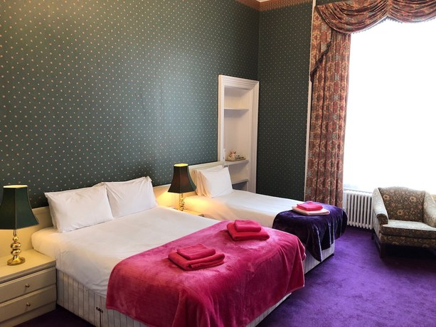 Imagen de la habitación del Hotel Eliza House. Foto 10