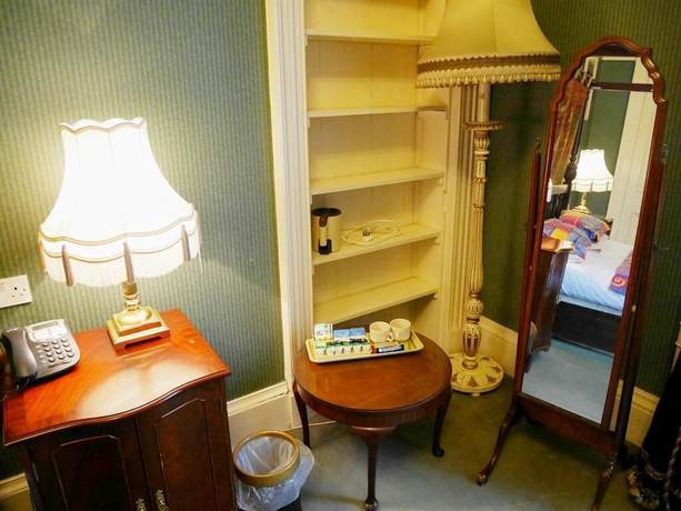 Imagen de la habitación del Hotel Eliza House. Foto 15