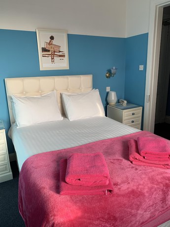 Imagen de la habitación del Hotel Eliza House. Foto 16