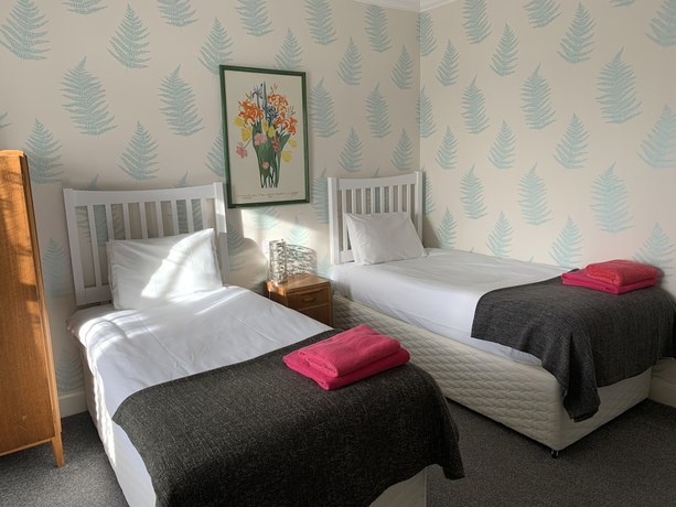 Imagen de la habitación del Hotel Eliza House. Foto 17