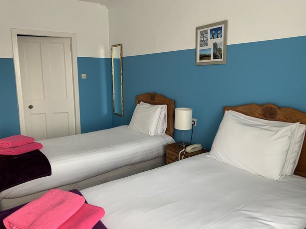 Imagen de la habitación del Hotel Eliza House. Foto 18