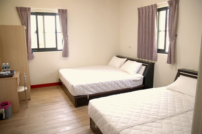 Imagen de la habitación del Hotel Eliza Inn. Foto 20