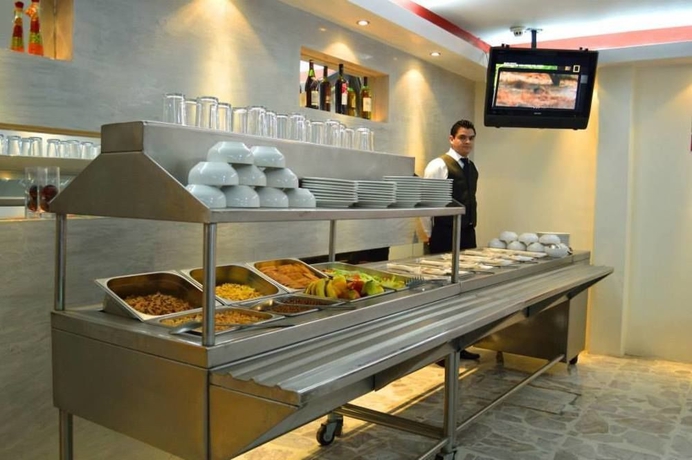 Imagen del bar/restaurante del Hotel Elizabeth Ciudad Deportiva. Foto 6