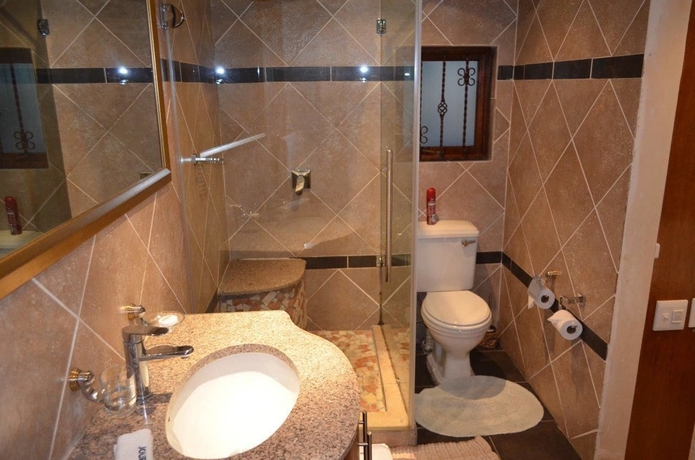 Imagen de la habitación del Hotel Elizabeth Manor. Foto 15