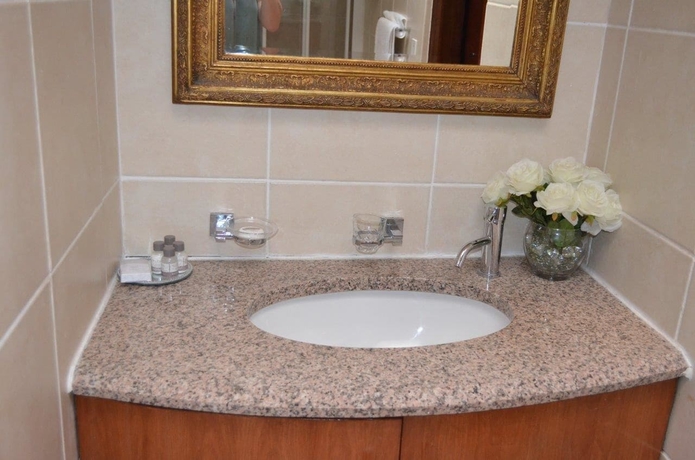 Imagen de la habitación del Hotel Elizabeth Manor. Foto 17