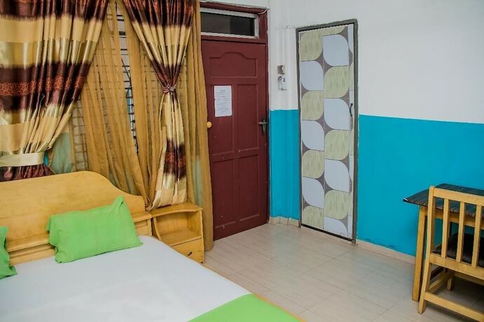Imagen de la habitación del Hotel Elizz Guest House. Foto 17