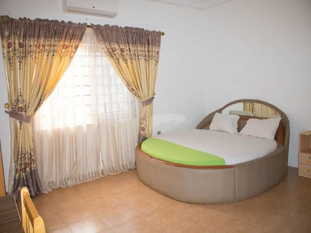 Imagen de la habitación del Hotel Elizz Guest House. Foto 19