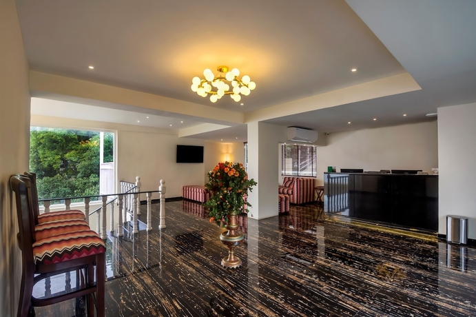 Imagen de los interiores del Hotel EllBee Mussoorie Hills. Foto 16