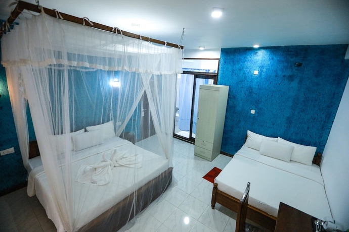 Imagen de la habitación del Hotel Ella Flower Garden Resort. Foto 7