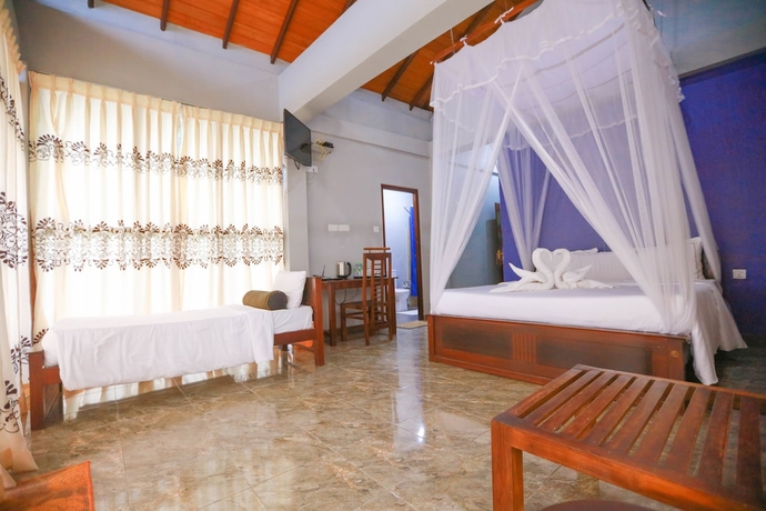 Imagen de la habitación del Hotel Ella Flower Garden Resort. Foto 9