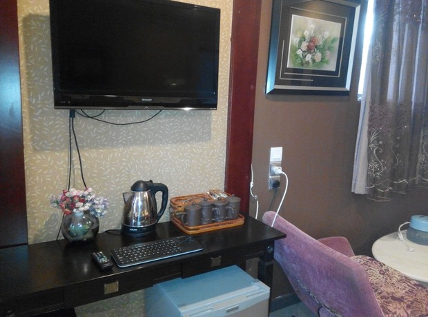 Imagen de la habitación del Hotel Ella Holiday Inn. Foto 7