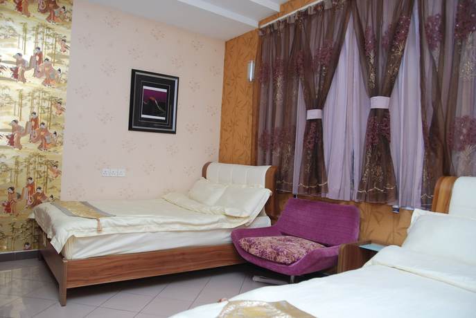 Imagen de la habitación del Hotel Ella Holiday Inn. Foto 8