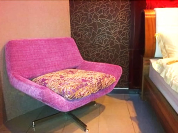 Imagen de la habitación del Hotel Ella Holiday Inn. Foto 13