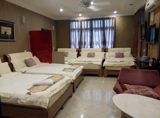 Imagen de la habitación del Hotel Ella Holiday Inn. Foto 14