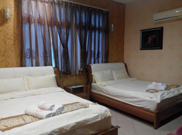 Imagen de la habitación del Hotel Ella Holiday Inn. Foto 16
