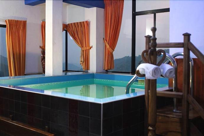 Imagen de la habitación del Hotel Ella Mount Heaven. Foto 15