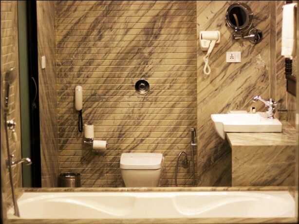 Imagen de la habitación del Hotel Ellbee Ganga View. Foto 36