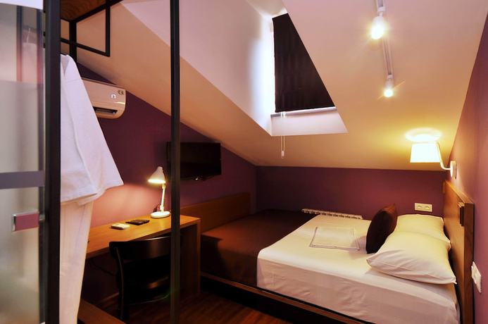 Imagen de la habitación del Hotel Elle Boutique. Foto 11